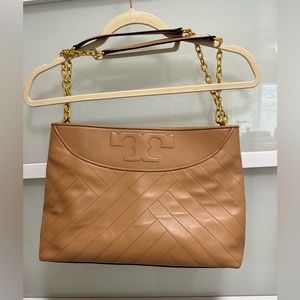Tory Burch leather shoulder bag. Soft camel color with multiple pockets